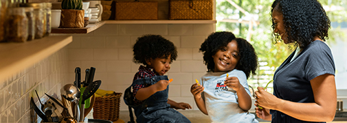 Mother and two kids in kitchen